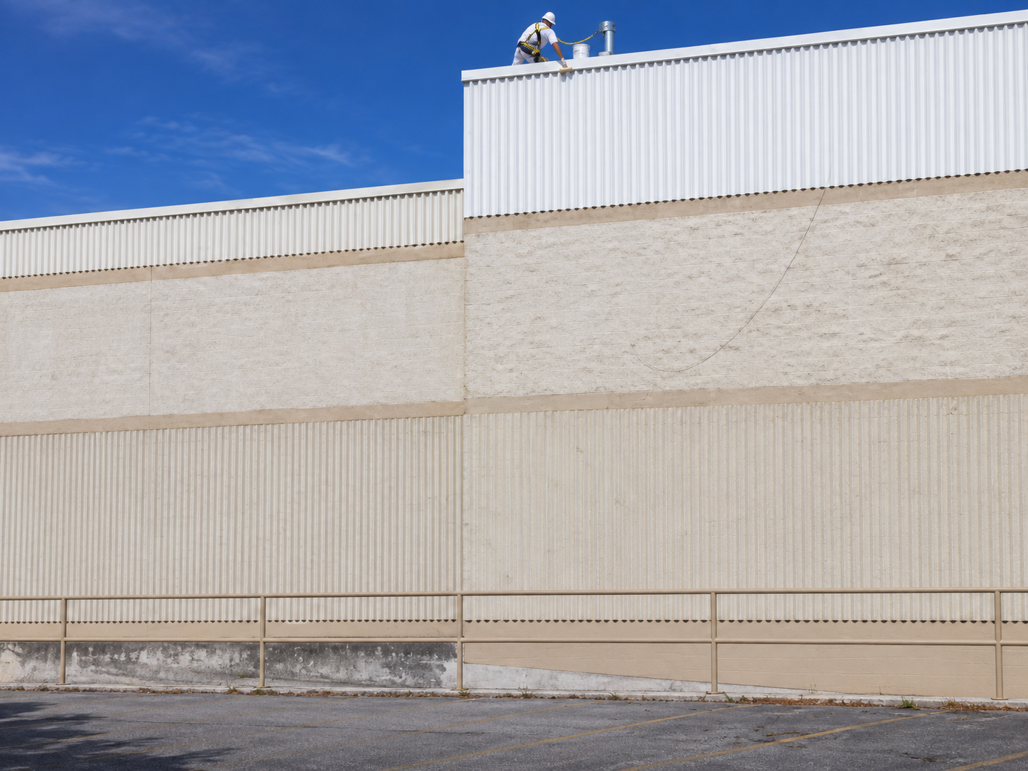 Port St. Lucie commercial industrial facade before completion, with preparation and painting in progress